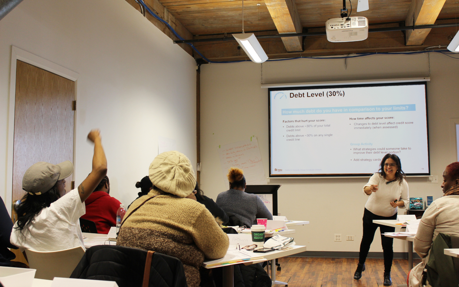 Volunteer Instructor Calling on Student in Class