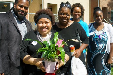 Habitat homebuyers greet each other