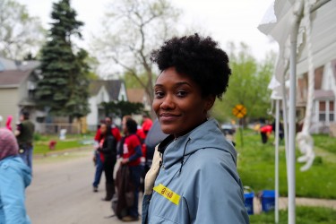 A Habitat volunteer at a community clean up day