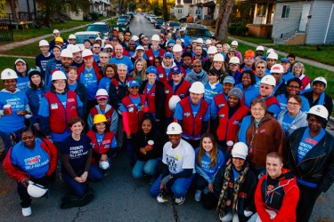 Group of volunteers right before a neighborhood clean up day