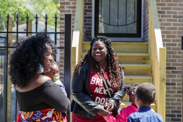 Habitat families and future neighbors at a home dedication ceremony