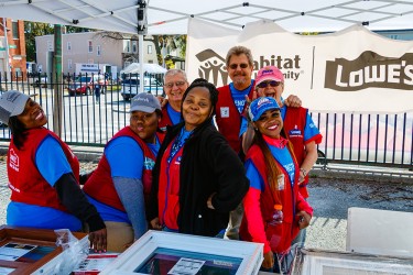 Lowe's team members volunteer on a Habitat Chicago block improvement project