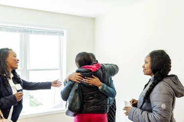 Neighbors greet each other at a Habitat Chicago home