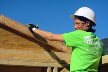 Women Build volunteer advances new home construction of a future woman homeowner