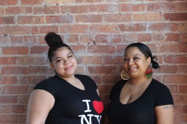 Tabitha and her daughter proudly pose before making their interior design selections