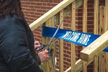 "Welcome Home" ribbon cutting