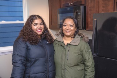 Homebuyer and daughter in new Habitat home