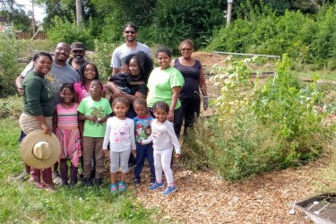 Community Members in their Garden