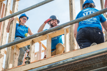 Habitat Construction Staff Engaging in Conversation