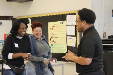 Residents talking to Habitat Staff member during engagement activity