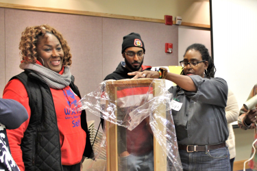 Participants participating in a Home Care Workshop exercise