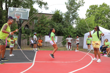 Double dutching on a bright new basketball court